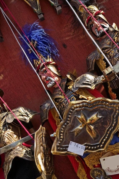 A close-up shot of a cosplayer's meticulously crafted League of Legends weapon, highlighting the intricate details and craftsmanship.