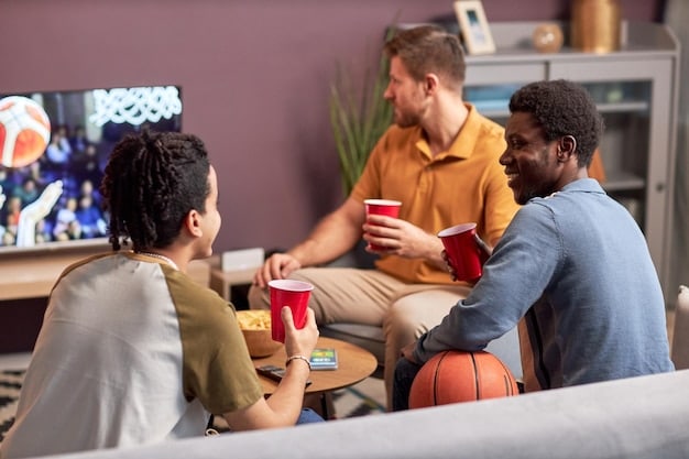 A collaborative team meeting taking place before a League of Legends match. Team members are seated around a table, reviewing strategies and providing support. The room has a welcoming atmosphere, with rainbow flags and supportive posters displayed.
