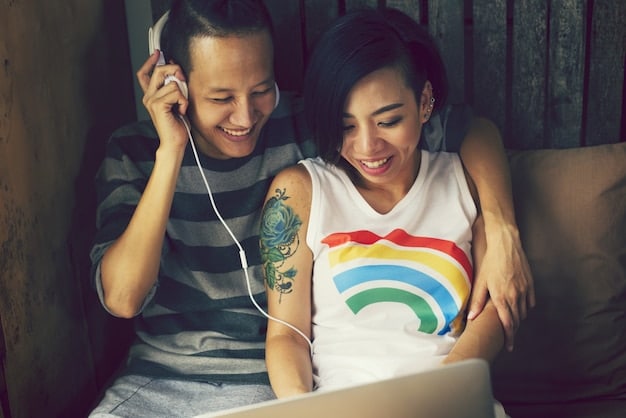 An LGBT League of Legends streamer engaging with their audience, with donation alerts and supportive messages visible on the screen. The streamer appears happy and grateful, highlighting community support related to what financial resources are available for LGBT League of Legends players pursuing professional careers in the US.