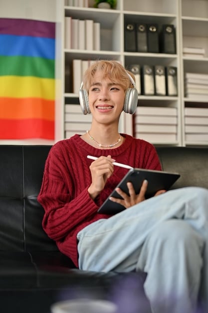 A close-up shot of an LGBT streamer on Twitch, interacting with their chat. The streamer is wearing a headset and has a pride flag displayed in the background. The image highlights the personal connection and community-building aspect of LGBT streamers within the esports scene, showcasing their role of LGBT streamers and influencers in shaping a more inclusive esports culture in the US.